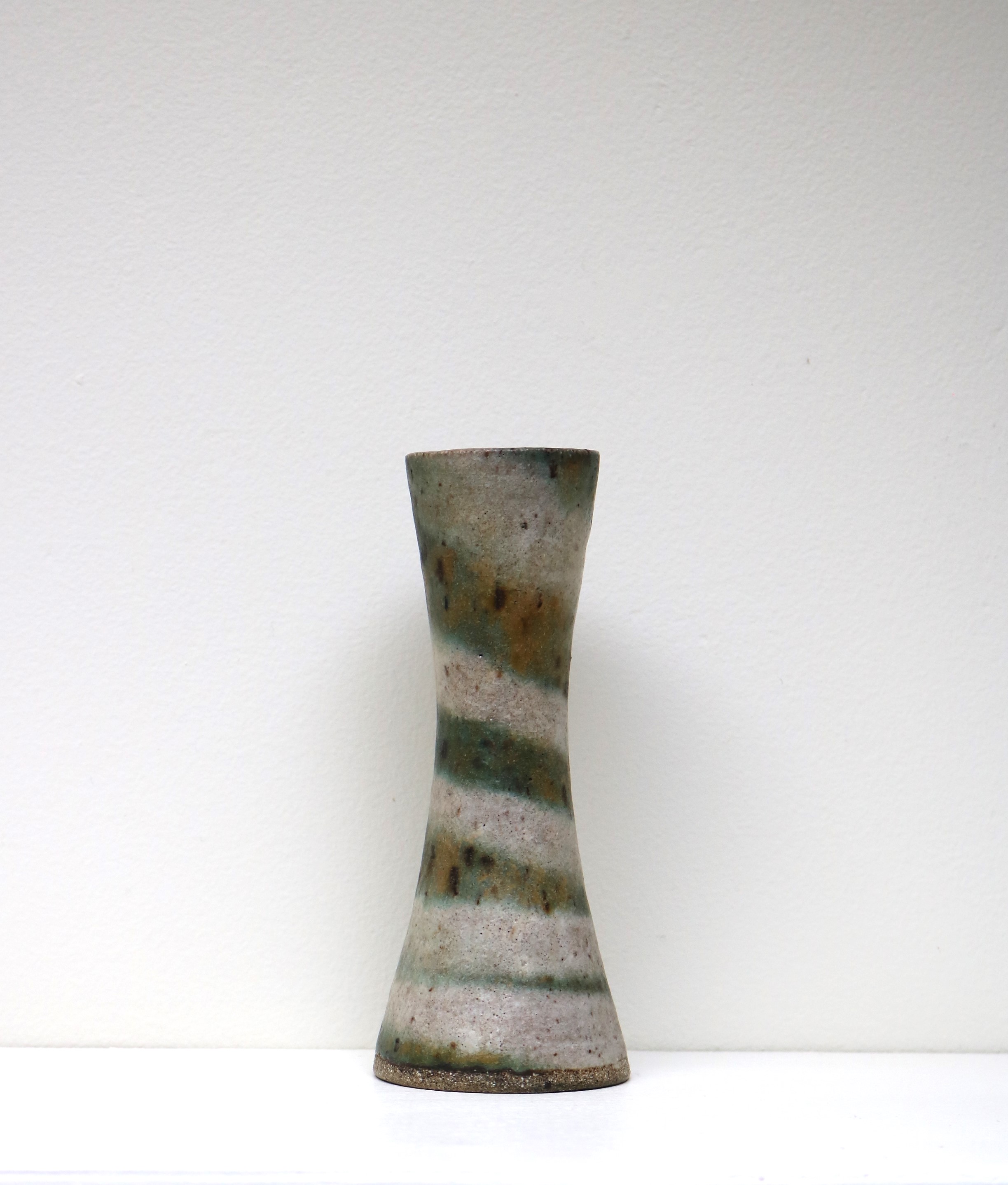 Lucie Rie  64. A small waisted ‘spiral’ vase, circa 1974